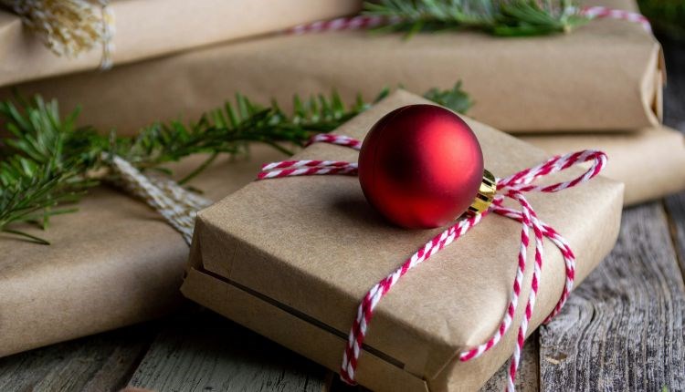 Presents and baubles on a wooden table, Christmas Fair at Northwood House, Isle of Wight, event, what's on, family fun, children activities, dog frien