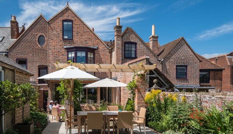 Outside dining area in garden at One Holyrood, B&B, Newport, Isle of Wight