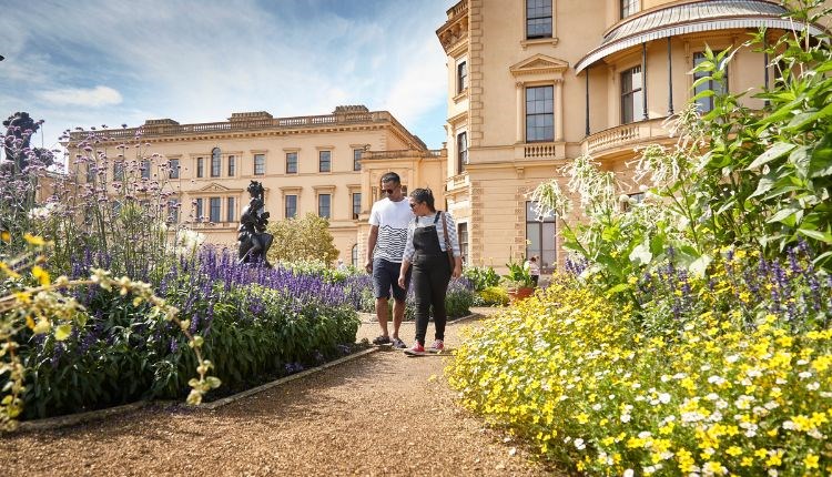 Couple walking around the garden outside Osborne House, garden tour, event, what's on, Isle of Wight