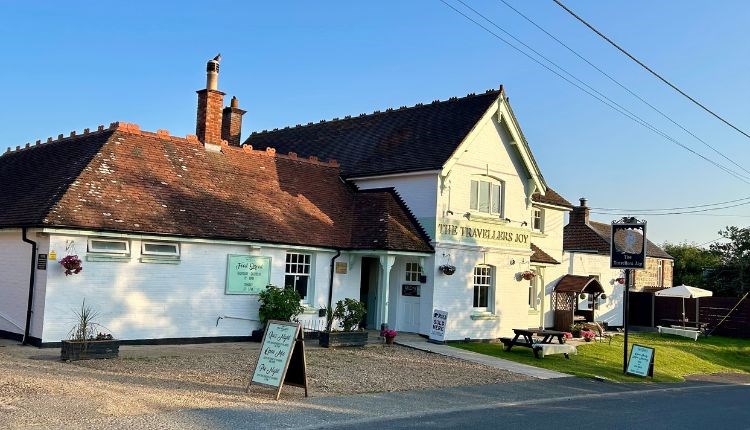 Outside view of The Traveller's Joy, pub, classic food, children's play ground, local produce, events
