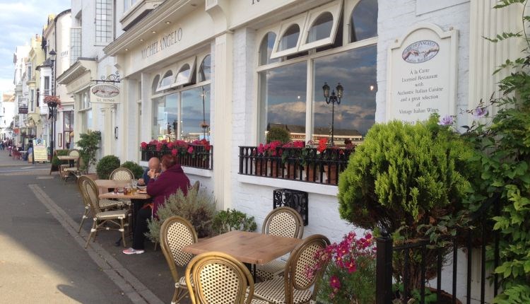 Outside view with table and chairs at Michelangelo restaurant, Ryde, Isle of Wight, Italian, eat & drink