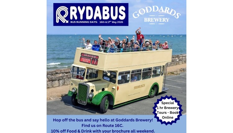 Isle of Wight, Things to do, vintage bus on seafront with waving guests advertising bus tours