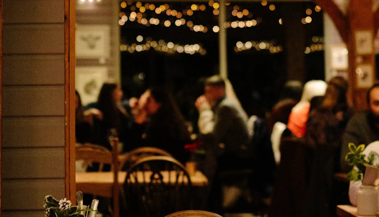 People eating inside The Garlic Restaurant, Isle of Wight, what's on, event, live music, food