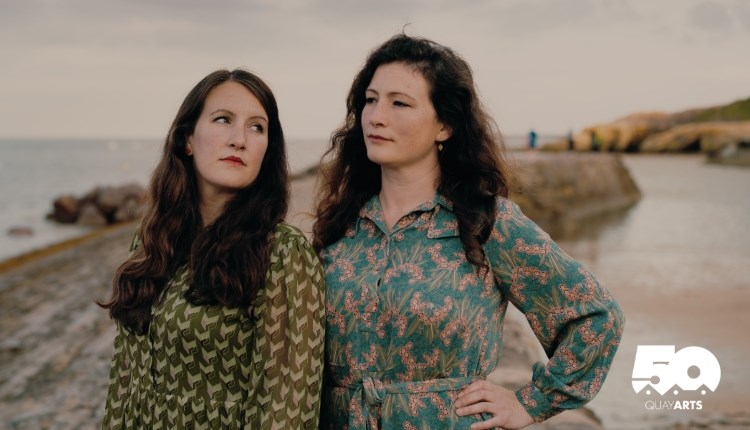 Isle of Wight, Things to do, 2 women standing on a coastal footpath