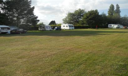 Touring caravans at Kite Hill Farm Caravan & Camping Park, Wootton, Isle of Wight, accommodation