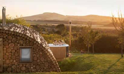 Outside view of Modulog with hot tub at Tapnell Farm, Isle of Wight, glamping, self catering - image credit: Skarsgard