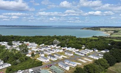 Aerial view of Thorness Bay Holiday Park, caravans, lodges, chalets, camping, touring pitches, glamping, outskirts of Cowes, Isle of Wight
