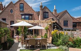 Outside dining area in garden at One Holyrood, B&B, Newport, Isle of Wight