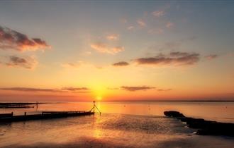 Sunset over Colwell Bay Beach, Isle of Wight, Things to Do