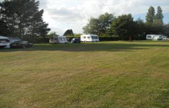 Touring caravans at Kite Hill Farm Caravan & Camping Park, Wootton, Isle of Wight, accommodation