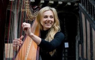 Fran Barsby playing the harp, live music at Michelangelo Restaurant, Italian food