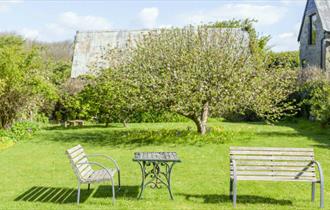 Outside garden area with benches at Gotten Manor Estate, Self catering, Isle of Wight