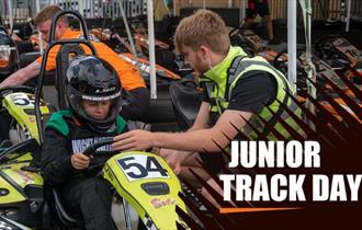 Man helping child with helmet before karting at Wight Karting, Ryde, Children's Events, junior track days