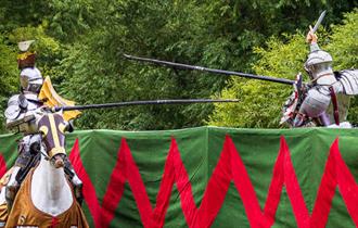 Knights competing in the grand medieval joust at the Legendary Joust at Carisbrooke Castle, history event, what's on