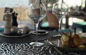 Dish of food on table with festive decorations, New Year's Eve party at Albion Hotel, Isle of Wight, what's on, event