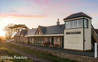 Sunset, outside view of Off The Rails Yarmouth, Isle of Wight, restaurant