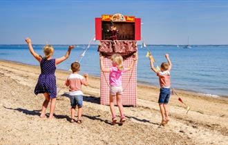 Punch & Judy show on the beach at Osborne, Isle of Wight, historic attraction, family fun, children's activities, summer event, what's on