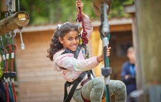Girl on zipwire at PGL Little Canada, Wootton, Isle of Wight, Things to do, event, what's on, children's activities