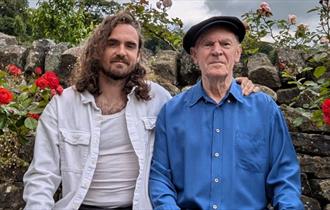 Ashley Hutchings and Blair Dunlop sitting together, music celebration, father and son, event, what's on, music event at Quay Arts, Newport, Isle of Wi