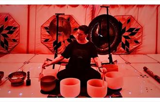 Isle of Wight, things to do, ventnor fringe, sound bath, man sitting in front of sound bowls