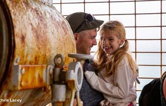 Father and daughter at The Needles Old Battery, National Trust, event, what's on image credit: Chris Lacey