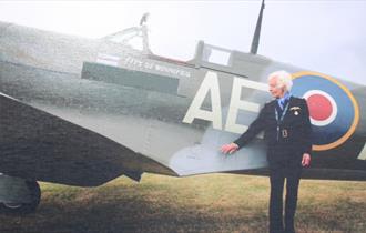 Mary Ellis standing next to a Spitfire, Isle of Wight aviation history at Wight Aviation Museum, island life at Quarr Abbey, event, what's on