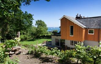 Exterior view of Woodland Cottage, Fort Victoria Cottages, Yarmouth, Isle of Wight, Self catering