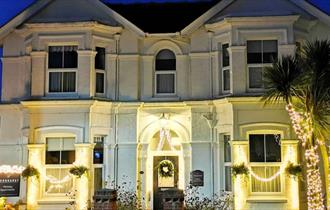 Christmas decorations and lights outside of Fernhurst Holiday Apartments, self catering, Shanklin, Isle of Wight