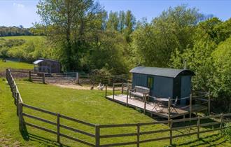 Aerial view of The Hut within the countryside, Godshill Park Farm, Isle of Wight, Self Catering