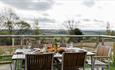 Outside dining area on decking at Fastnet, Fair Isle Holiday Cottages, self catering, Newport, Isle of Wight