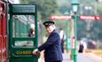 Guard opening the steam train door, Isle of Wight Steam Railway, Things to Do, Isle of Wight