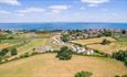 Isle of Wight, Accommodation, Seaview Holidays, image showing aerial view of Holiday cottages and views to sea.