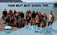 Group of children on Alum Bay beach with the Needles in the background, Diamond Adventures, school groups, educational trips, residential trips, day t