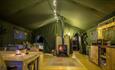 Living and kitchen area in tent at Sibbecks Farm Glamping, Self-catering, Isle of Wight