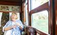 Lady sitting in the carriage of the steam train, Isle of Wight Steam Railway, Things to Do, Isle of Wight