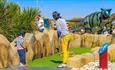 Adult and child playing on the Dino Islands golf at Sandham Gardens, Sandown, Things to Do