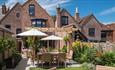 Outside dining area in garden at One Holyrood, B&B, Newport, Isle of Wight