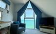 Master bedroom with sea views in BayVue Apartment, The Bay House apartments, Shanklin, Isle of Wight, self catering, luxury