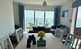 Open plan dining and living area with sea view in BayVue Apartment, The Bay House apartments, Shanklin, Isle of Wight, self catering, luxury