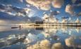 Clouds reflecting on the sea next to Bembridge lifeboat station, Bembridge Lane End Beach, Isle of Wight, Things to Do