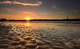 Sunset over the sandy beach at Bembridge, Isle of Wight, things to do