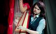 Benjamin Creighton Griffiths playing the harp, live music at Michelangelo Restaurant, Italian food