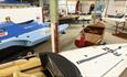 Collection of boats at The Boat Shed, Cowes, Isle of Wight, Maritime Museum