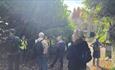 Joanne Knowles and a group of walkers outside an historic house in Bonchurch, Isle of Wight Spring Walking Festival, event, what's on