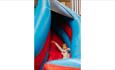 Girl sliding down the bouncy castle slide at Bouncy Barn Fun event at Tapnell Farm Park, children's event, what's on, Isle of Wight