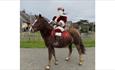 Isle of Wight, Christmas Tree festival, Brighstone, Santa on Horseback The Three Bishops