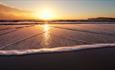 Sunset reflecting on the sea at Compton Beach, Isle of Wight, Things to Do