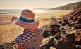 Lady watching the sea at Compton Beach, Isle of Wight, Things to Do