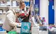 Ladies looking at books, Isle of Wight Literary Festival, Cowes, what's on, events