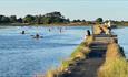 Man fishing at the Duver in St Helens, Old Mill Holiday Park, St Helens, Isle of Wight